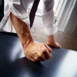 fist on desk